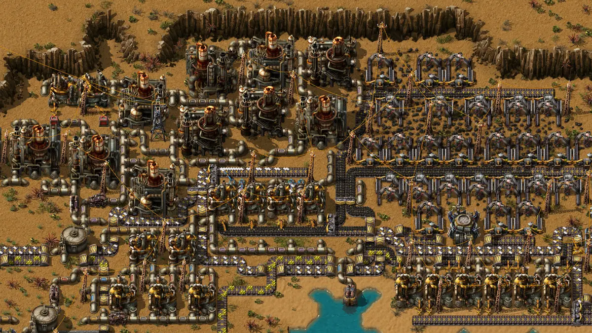 Factorio-bas i mid-game med ugnar och tidig produktion