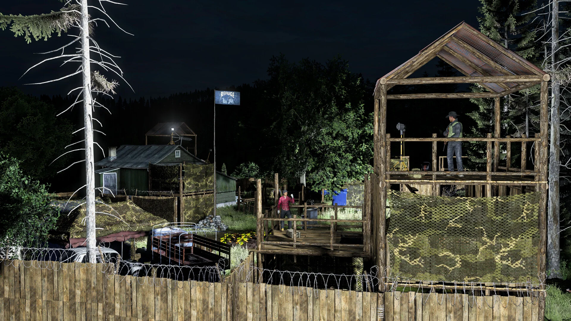 En inhägnad spelarbas med vakttorn och strålkastare i DayZ