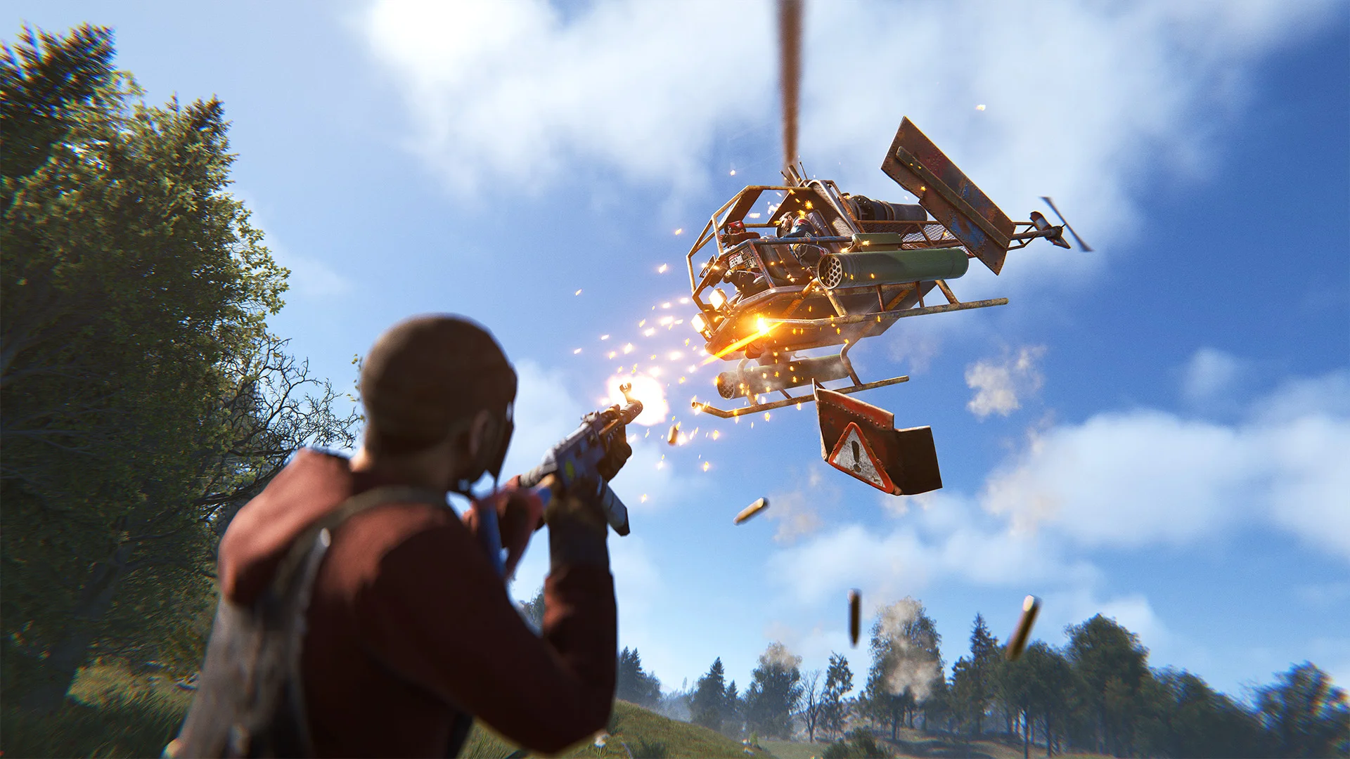 En spelare som skjuter mot en attack helicopter i Rust
